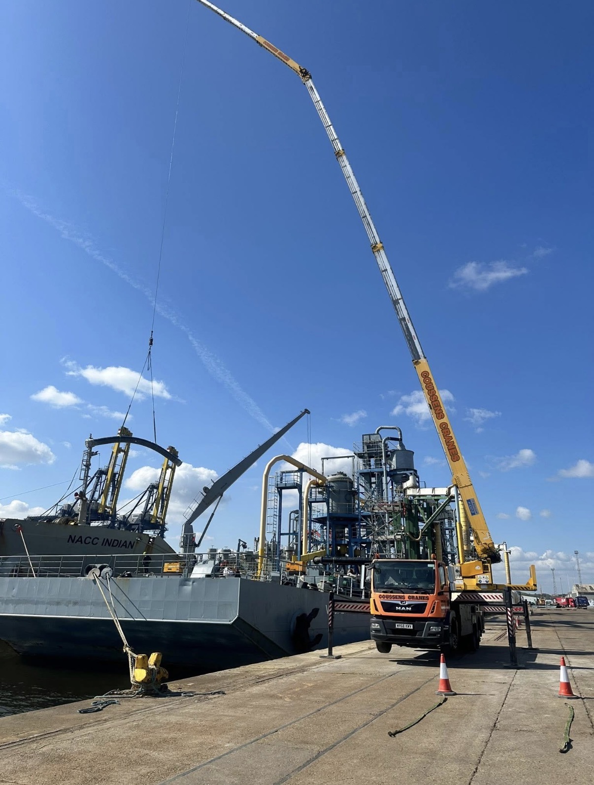 Coussens mobile crane lifting from the NACC Indian ship
