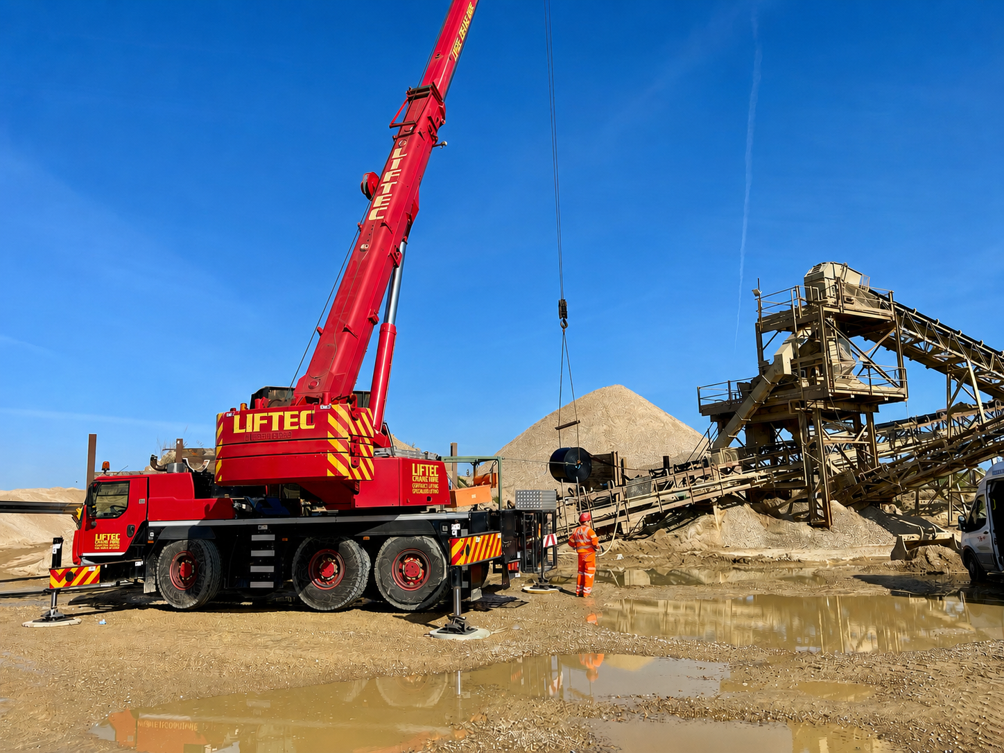 Liftec mobile crane rigged on outriggers at an aggregates plant